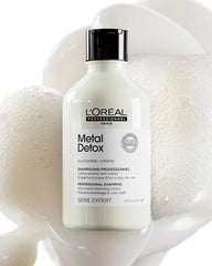L'Oréal Professionnel Serie Expert Metal Detox Shampoo 300ml anti-metal cleansing cream front view on soft cream background