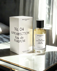 No. 04 Love Affection Eau de Parfum bottle on reflective surface