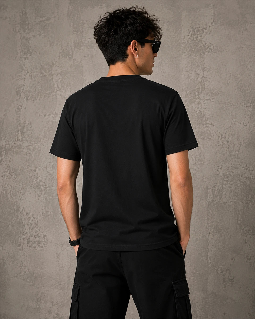 Model wearing Akira Tetsuo and Kaneda black graphic T-shirt showing the back design