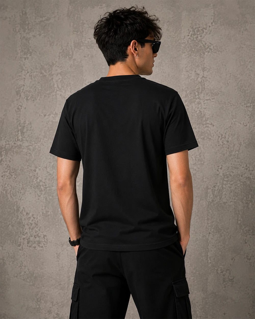 Model wearing Akira Tetsuo and Kaneda black graphic T-shirt showing the back design