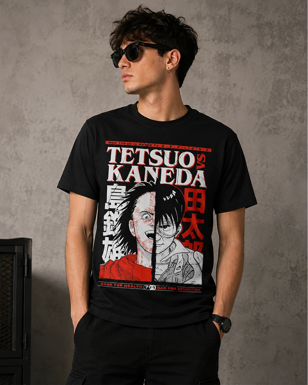 Model wearing Akira Tetsuo and Kaneda black graphic T-shirt, front view