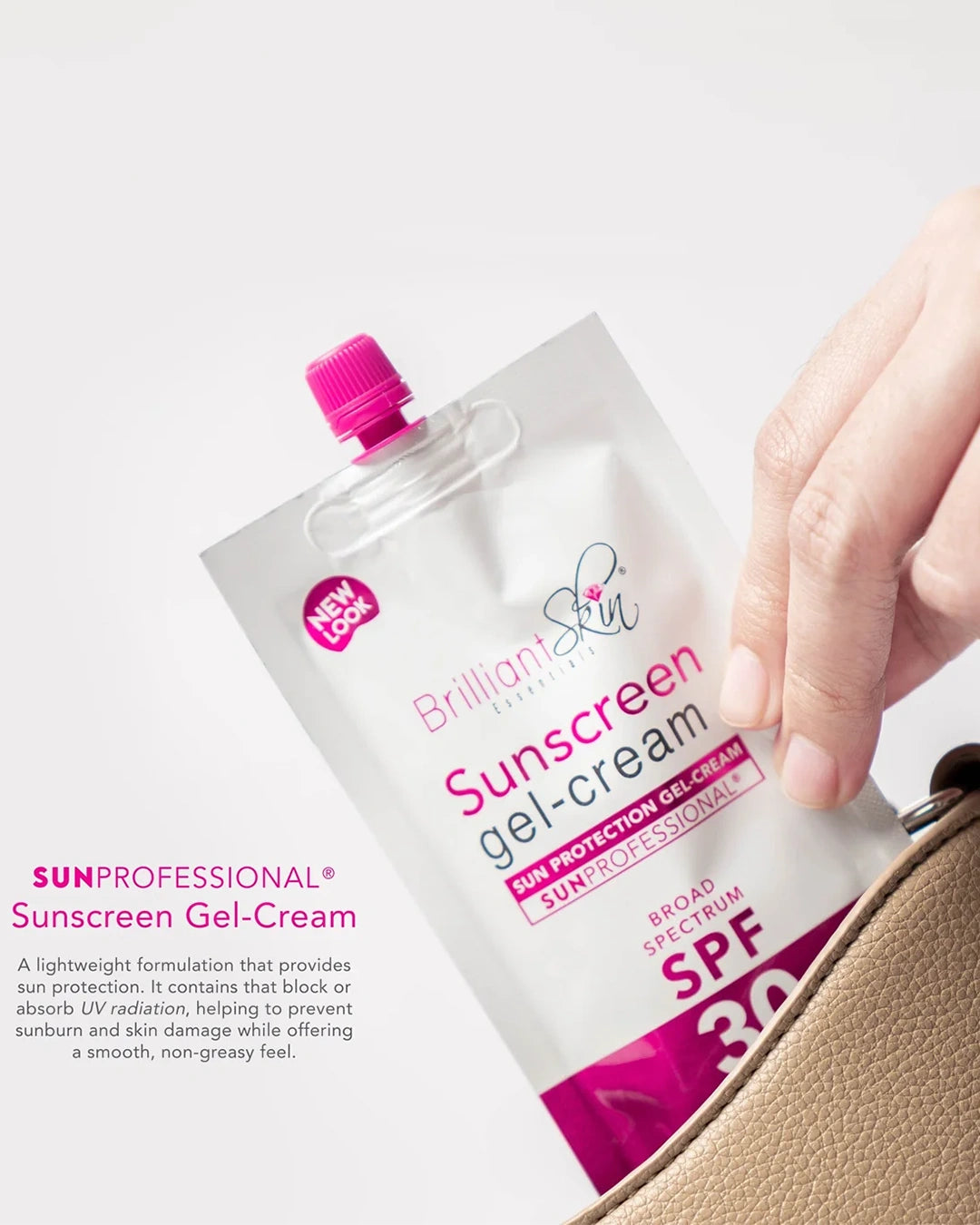 Brilliant Skin Sunscreen Gel-Cream SPF 30 pouch held in hand with cream being applied to skin