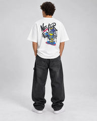 Back view of model wearing duck oversized T-shirt with large streetwear graphic