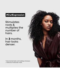 L'Oréal Professionnel Curl Expression Density Stimulator benefit image showing curly hair model and message about stimulating roots and improving hair density