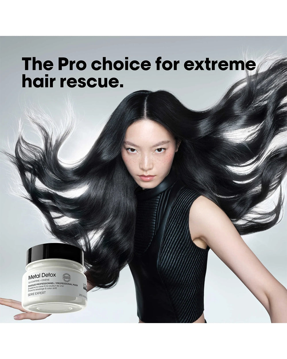 L'Oréal Professionnel Metal Detox Mask promotional visual featuring extreme hair rescue message and shiny flowing hair