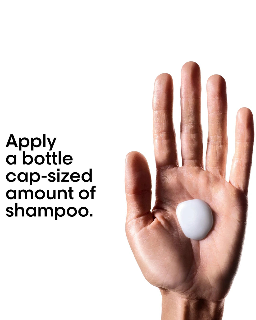 How to use L'Oréal Professionnel Metal Detox Shampoo showing a bottle cap sized amount of shampoo in hand