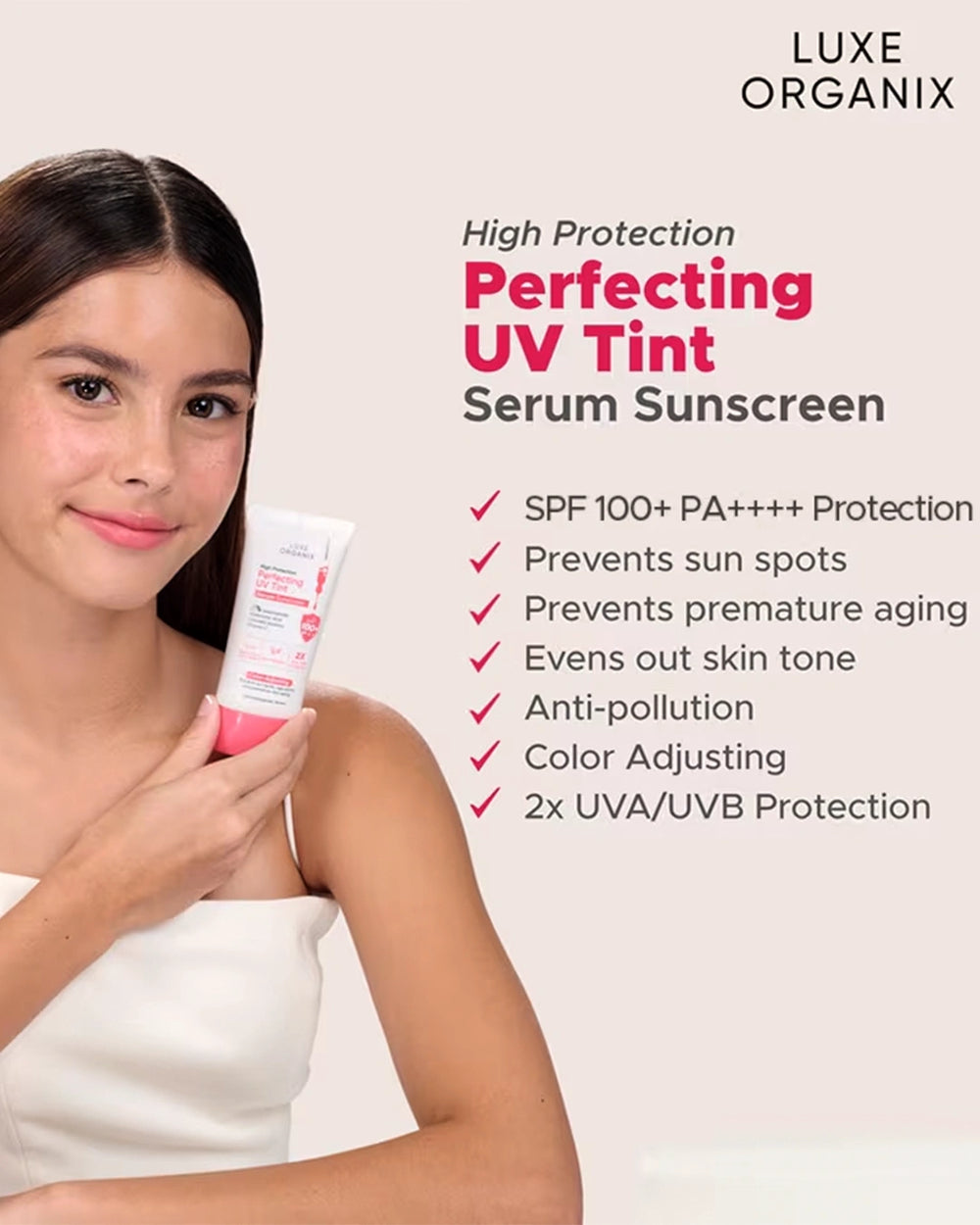 Model holding Luxe Organix Perfecting UV Tint Serum Sunscreen with highlights for sun protection, even-looking skin tone and color adjustment