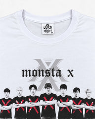 Close-up of MONSTA X group photo graphic with red X details and band lettering on white T-shirt