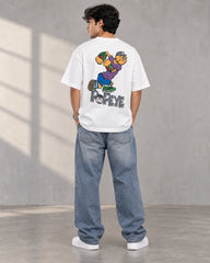 Back view of model wearing a white Popeye oversized T-shirt with large graphic