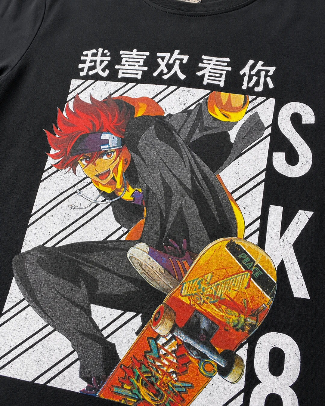 Close-up of Reki Kyan skateboard anime graphic print on black SK8 the Infinity T-shirt