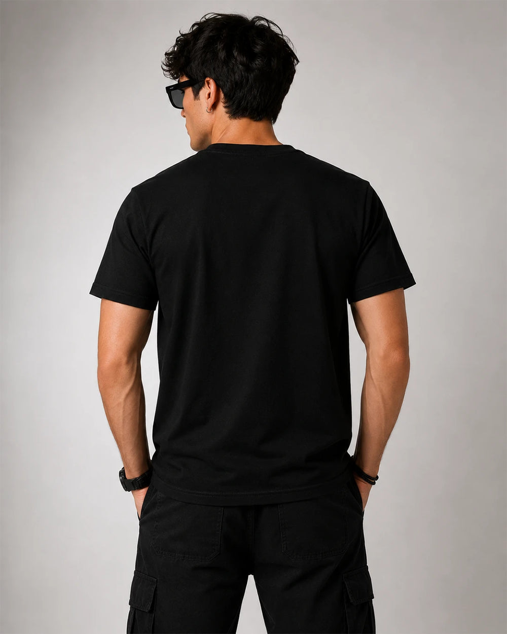 Model wearing Viking Warrior black graphic T-shirt showing the back view